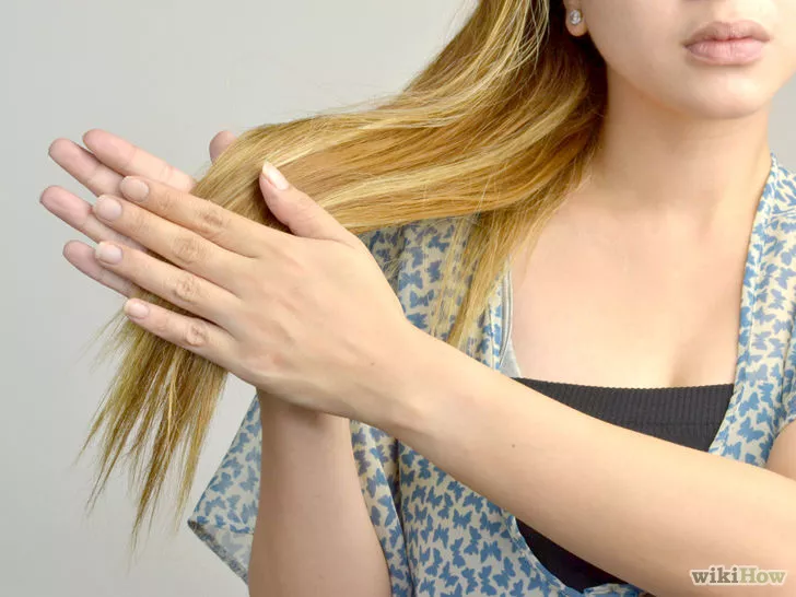 Step 2 Use coconut oil to  smooth flyaways.